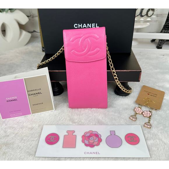 CHANEL Handbags - Chanel pink leather phone case pouch crossbody bag with chains CUTE